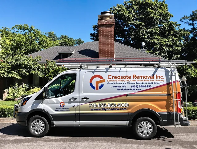Bay Village Chimney Sweep technician removing creosote safely in Bay Village, OH